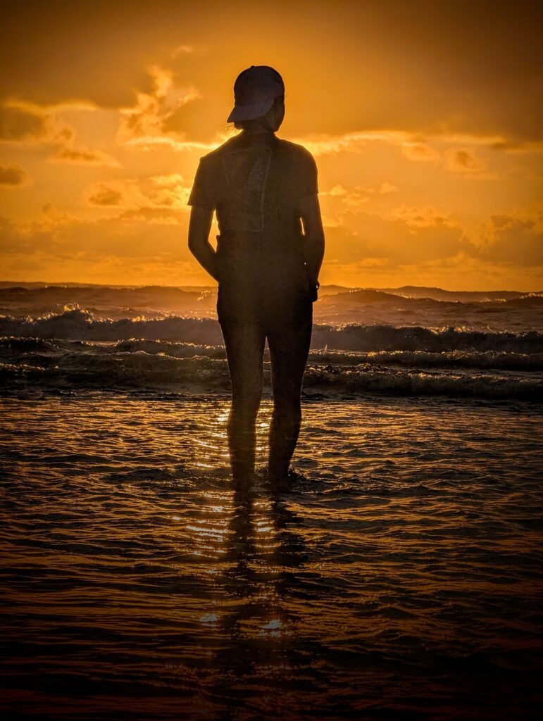 Traveler at sunrise overlooking a new city—Eat Smarter. Travel Farther.